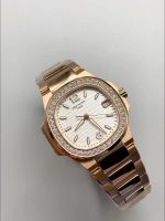 Patek Philippe Nautilus 7010/1GR-011 32MM- Genuine Diamonds on Bezel - Image 2