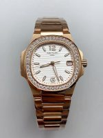 Patek Philippe Nautilus 7010/1GR-011 32MM- Genuine Diamonds on Bezel