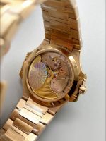 Patek Philippe Nautilus 7118R 35MM Rose Gold White Dial - Image 4