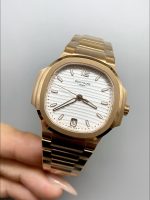 Patek Philippe Nautilus 7118R 35MM Rose Gold White Dial - Image 3